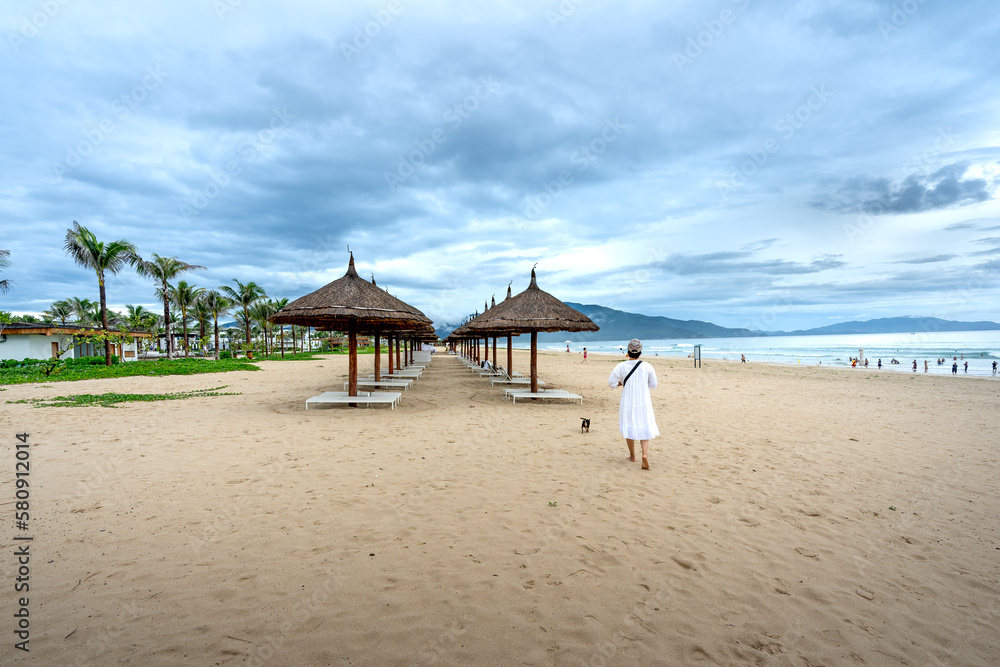 The umbrellas and chairs by the seaside Bai Dai in Khanh Hoa province, Vietnam The umbrellas and chairs by the seaside Bai Dai in Khanh Hoa province, Vietnam
