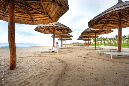 The umbrellas and chairs by the seaside Bai Dai in Khanh Hoa province, Vietnam