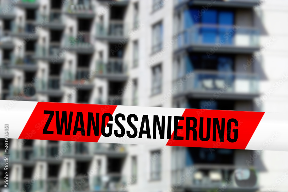 Ein Haus und Hinweis auf Zwangssanierung wegen Öl- und Gasheizungsverbot Ein Haus und Hinweis auf Zwangssanierung wegen Öl- und Gasheizungsverbot