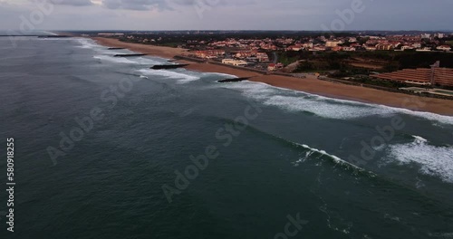 Aerial View of Anglet Beach Plage de la Chambre d'Amour in French Basque Country with multiple jetties and waves crashing on the sandy beaches photo