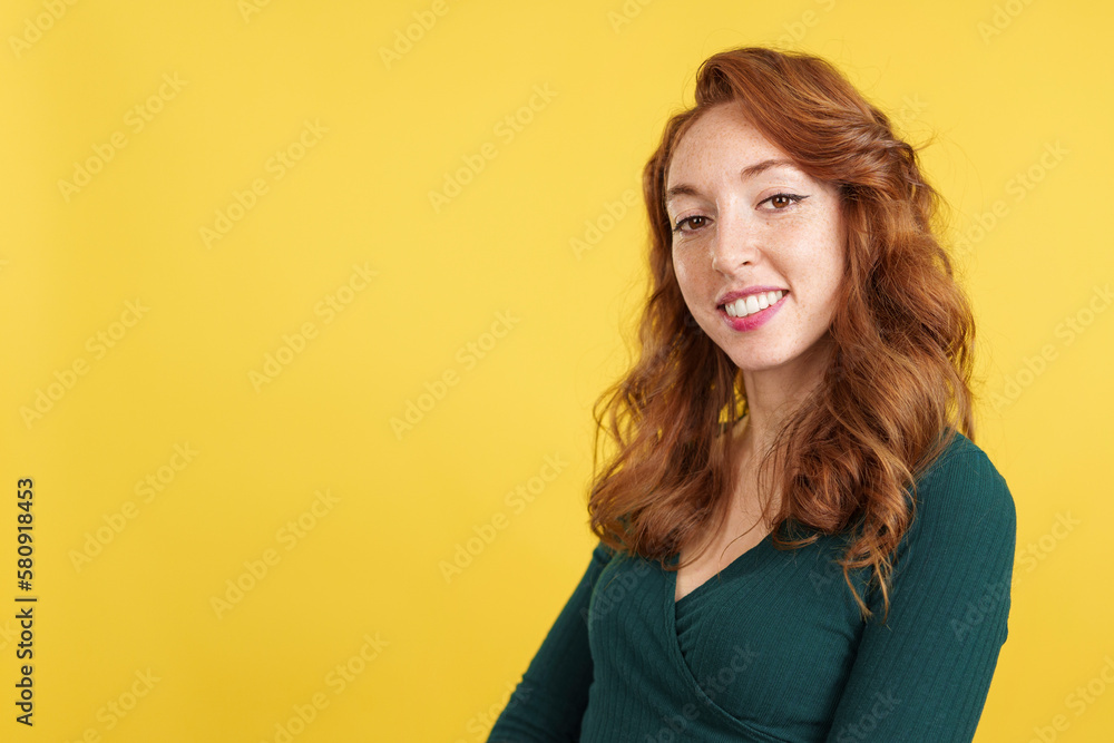 Cool redheaded woman looking at the camera relaxed Cool redheaded woman looking at the camera relaxed