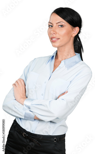 Businesswoman leaning back slightly with her arms crossed