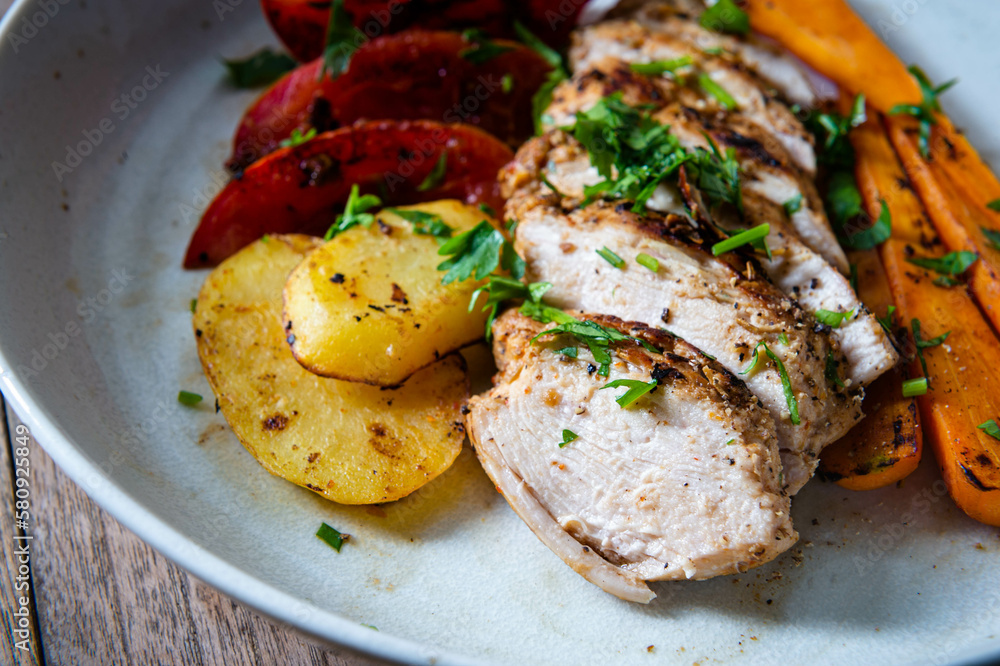 Grilled Chicken Breast with Black Pepper and Vegetables, Clean food style. Grilled Chicken Breast with Black Pepper and Vegetables, Clean food style.