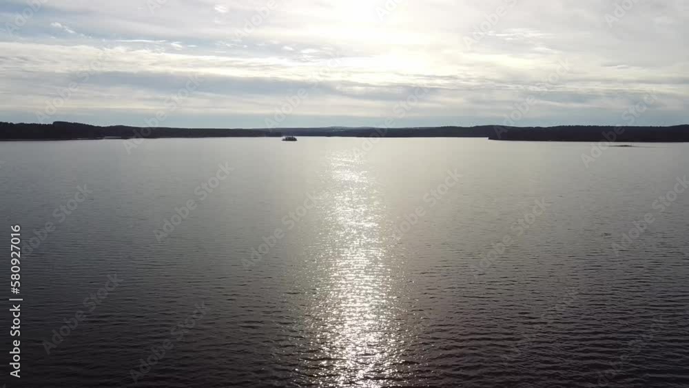 Drone flying backwards over the Wachusett Reservoir Dam. Drone flying backwards over the Wachusett Reservoir Dam.