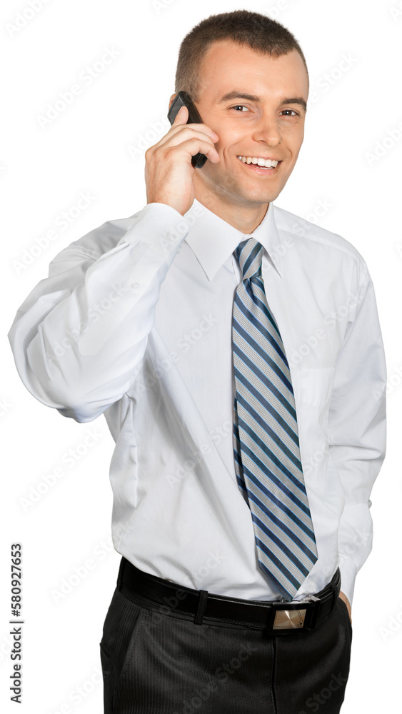 Businessman Talking on the Phone with Hand in Pocket - Isolated Businessman Talking on the Phone with Hand in Pocket - Isolated