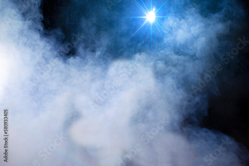 Stage smoke blue with light beam.Smoke star.