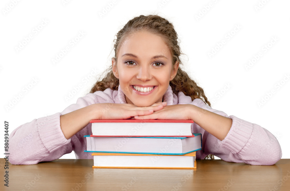 Friendly Young Girl Sitting Behind a Desk with a Books - Isolated Friendly Young Girl Sitting Behind a Desk with a Books - Isolated