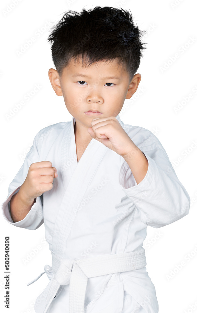 Asian Little Karate Boy in White Kimono on background Asian Little Karate Boy in White Kimono on background