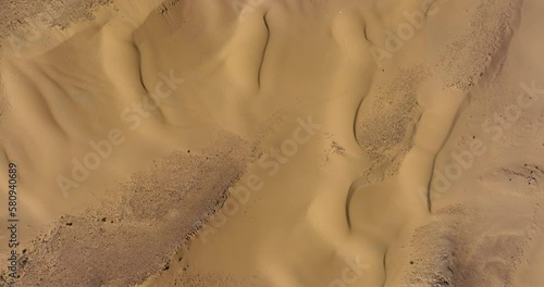 Aerial footage of Kasuy Dunes In the Southern Negev and Arava region. Amazing golden sand dunes. Filmed in C4K Apple ProRes 422 HQ photo