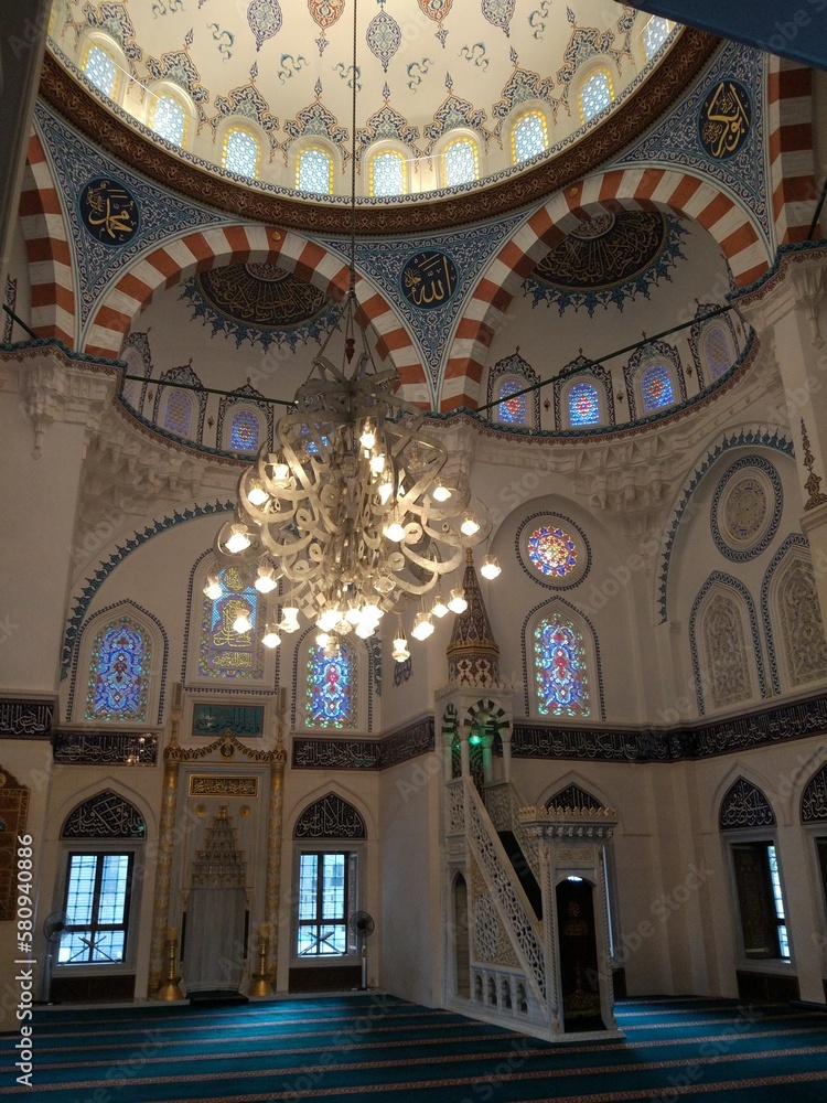 Inside of the Dome of Tokyo Camii Mosque. Ceiling with crystal chandeliers in the interior of the mosque