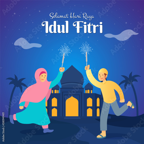 Selamat hari raya Idul Fitri is another language of happy eid mubarak in Indonesian. kids in muslim clothes jumping and playing with firecracker celebrating eid mubarak in the night