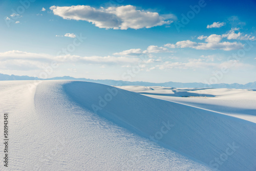 Scenic view of snowy landscape against cloudy sky