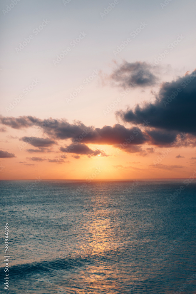 Scenic view of sea against sky at sunset Scenic view of sea against sky at sunset
