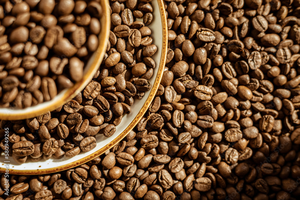 Fototapeta premium Сoffee beans poured into a coffee pair