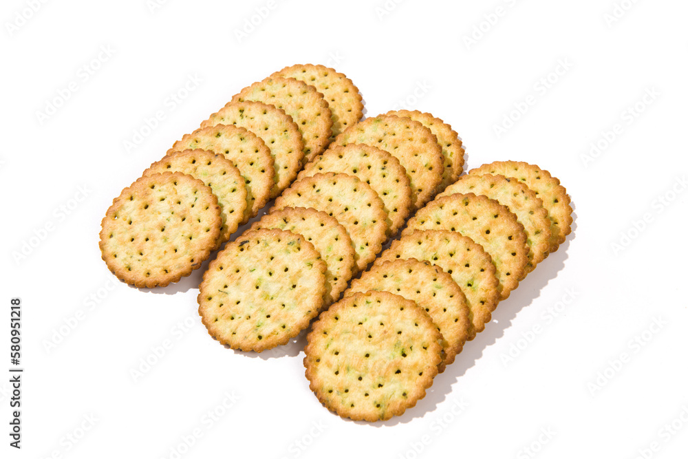Heap of round thin crispy biscuits isolated on white background. Heap of round thin crispy biscuits isolated on white background.