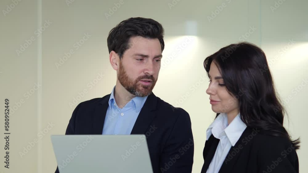 Female and male colleagues are deeply engrossed in their collaborative efforts on a new project, utilizing a laptop to share develop their ideas. Seamless teamwork is fueled by their shared ambition. Female and male colleagues are deeply engrossed in their collaborative efforts on a new project, utilizing a laptop to share develop their ideas. Seamless teamwork is fueled by their shared ambition.