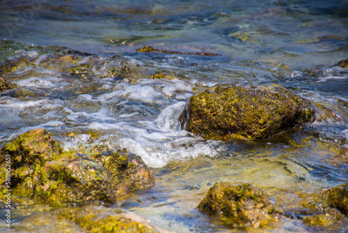 water flowing over rocks © Johanes