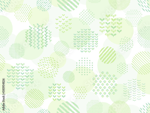 手描き風の緑の植物とドットとストライプ柄の円のパターン背景