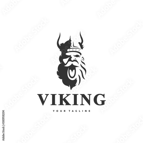 Viking head logo design. Nordic warrior symbol. Horned Norseman coat of arms. Barbarian man head icon with helmet horns and beard. Brand identity vector illustration.