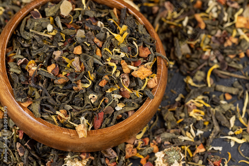 fresh green tea with pieces of fruit and berries fresh green tea with pieces of fruit and berries