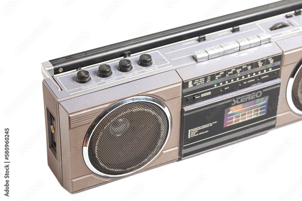 Retro portable stereo radio cassette recorder isolated on white. Retro portable stereo radio cassette recorder isolated on white.