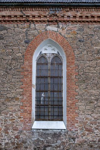 Old window on the wall of the Church