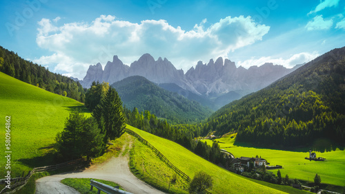 Val di Funes landscape. San Giovanni in Ranui chapel and Odle mountain, Dolomites Alps, Italy. photo