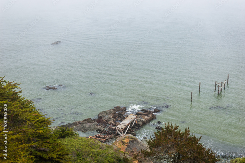 Misty Morning Overlook of a Destroyed Dock at Golden Gate National Recreation Area Misty Morning Overlook of a Destroyed Dock at Golden Gate National Recreation Area