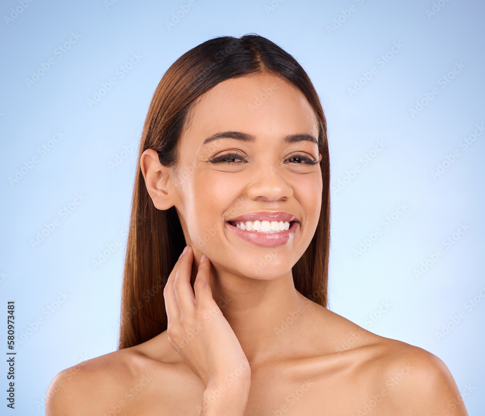 Portrait, smile and woman with dermatology, cosmetics and grooming against blue studio background. Face, lady and female with happiness, natural and salon treatment for morning routine and soft skin Portrait, smile and woman with dermatology, cosmetics and grooming against blue studio background. Face, lady and female with happiness, natural and salon treatment for morning routine and soft skin