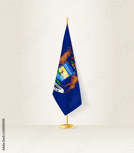 Michigan flag on a flag stand.