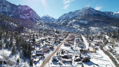 High drone aerial view of Ouray, Colorado on a sunny winter day photo