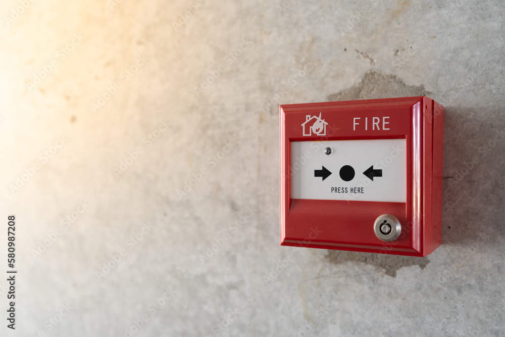 Fire alarm on the wall of the industrial plant Fire alarm on the wall of the industrial plant