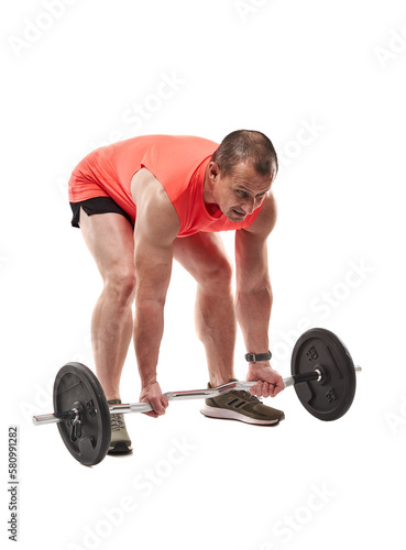 Mature man in pink tee doing fitness workout