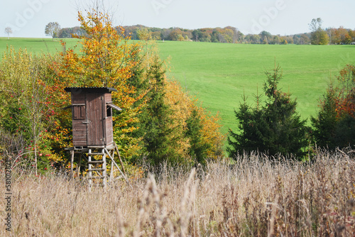 Hunters hut lodge in the field 