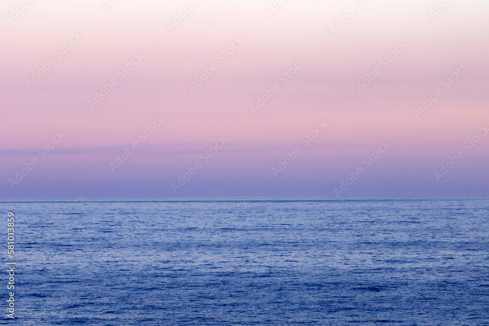Obraz premium Pinky sky view in sunset time over Mediterranean Sea in winter