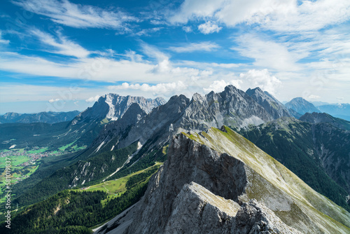Wallpaper Mural Wild alpine landscape with rocky mountains above Ehrwald at a beautfiful summer day. View to Zugspitze and Mieminger Kette, Tirol, Austria Torontodigital.ca