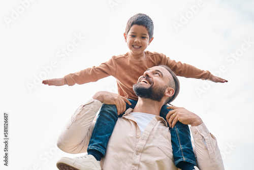 Принти на полотні Family, kids and boy sitting on the shoulders of his father outdoor while bonding from below