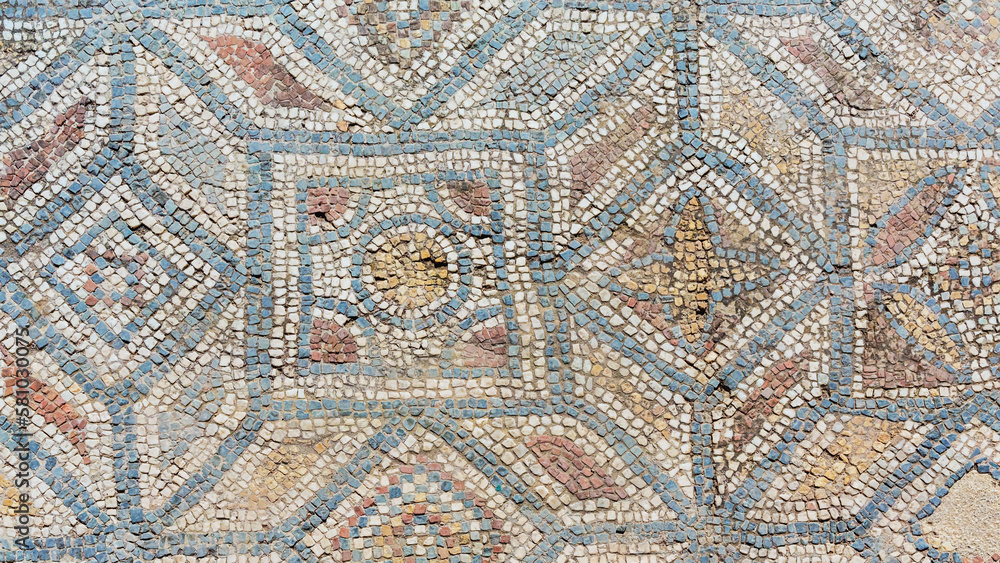 Archaeological remains with decorative tile floors and frescoes paintings in a hillside house on the slopes of the ancient city ruins of Ephesus, Turkey near Selcuk. Close up fragment