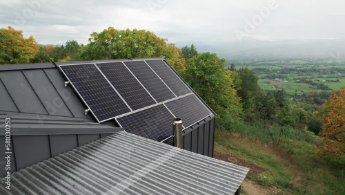 Wallpaper Mural New modern house cottage with solar photovoltaic panel system on roof. Aerial view. Concept of alternative, renewable energy and home autonomy. Torontodigital.ca
