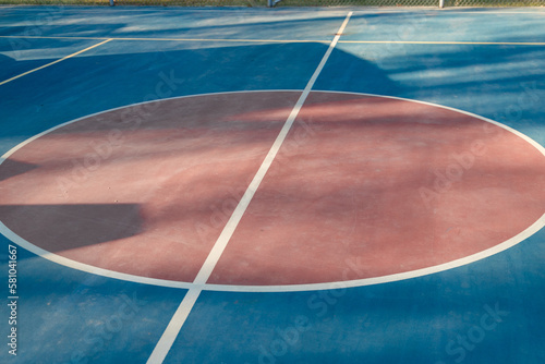 Blue floor of sports court with marking lines. © Roman