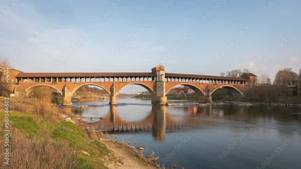 Ponte Coperto (covered bridge) and Duomo di Pavia (Pavia Cathedral) in Pavia at sunny day, Lombardy, italy. Timelapse 30 fps. Ponte Coperto (covered bridge) and Duomo di Pavia (Pavia Cathedral) in Pavia at sunny day, Lombardy, italy. Timelapse 30 fps.