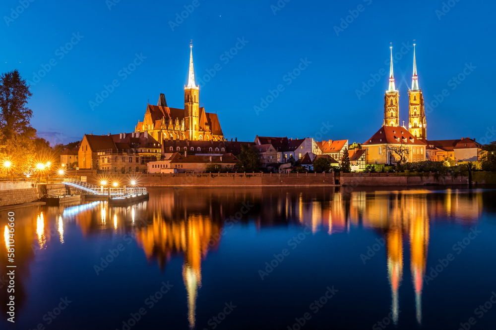 Wroclaw. Poland. View at Tumski island and Cathedral of St John the Baptist with bridge through river Odra - obrazy, fototapety, plakaty 