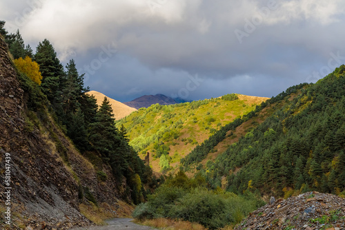 Highlands of North Ossetia. Mountains of the Caucasus. High mountains in the rays of the setting sun. © ЮРИЙ ПОЗДНИКОВ