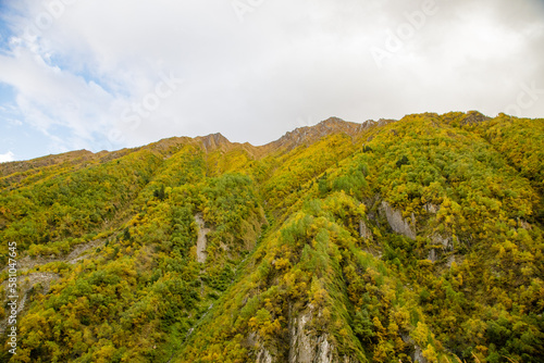 Highlands of North Ossetia. Mountains of the Caucasus. High mountains in the rays of the setting sun.