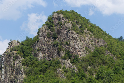 Rhodopes, are a mountain range in Southeastern Europe. Bulgaria. Panorama. The forest area covers the mountains.