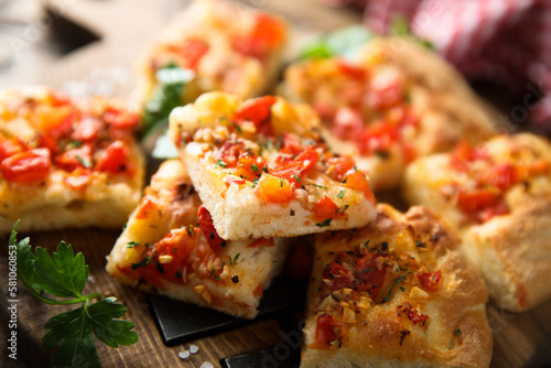 Traditional homemade focaccia with tomatoes