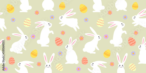 Easter Holiday Seamless pattern with rabbits, decorated eggs and flowers, wrapping paper, print, textile pattern.