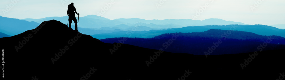 Climb climber adventure panorama background banner - Black silhouette of climbers on a cliff rock with misty fog mountains landscape