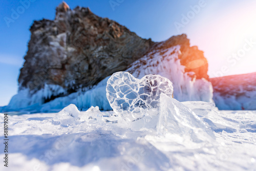 Ice frozen heart with sun light