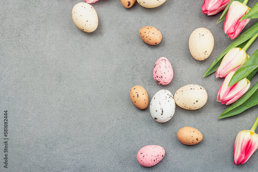 Easter flat lay with colorful eggs and tulips. Traditional decor, festive greeting card, holiday Easter flat lay with colorful eggs and tulips. Traditional decor, festive greeting card, holiday